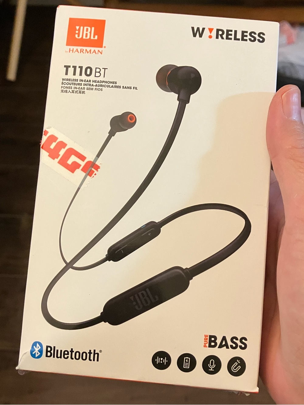 JBL T110BT Wireless Neckband Earbuds in Black with Orange Accents
